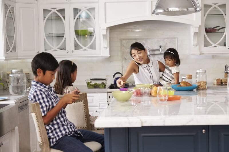 mother organising childs breakfast