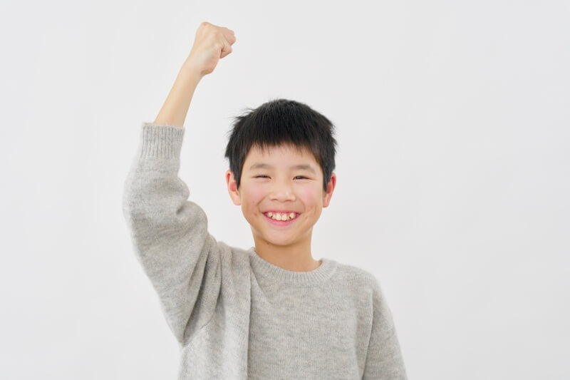 boy showing strength and growth