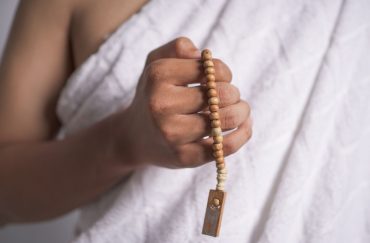 hari raya haji tasbih man holding prayer beads
