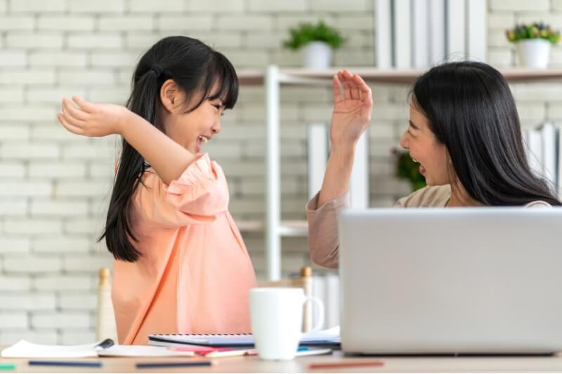 mum and daughter bonding and learning together