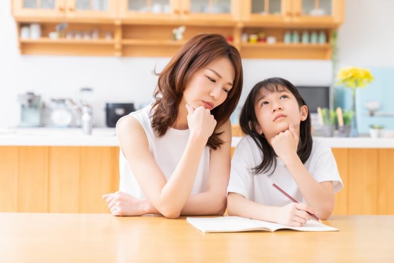 daughter and mother thinking and exploring together 