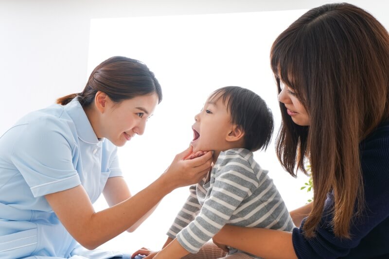 mother and son at the dentist