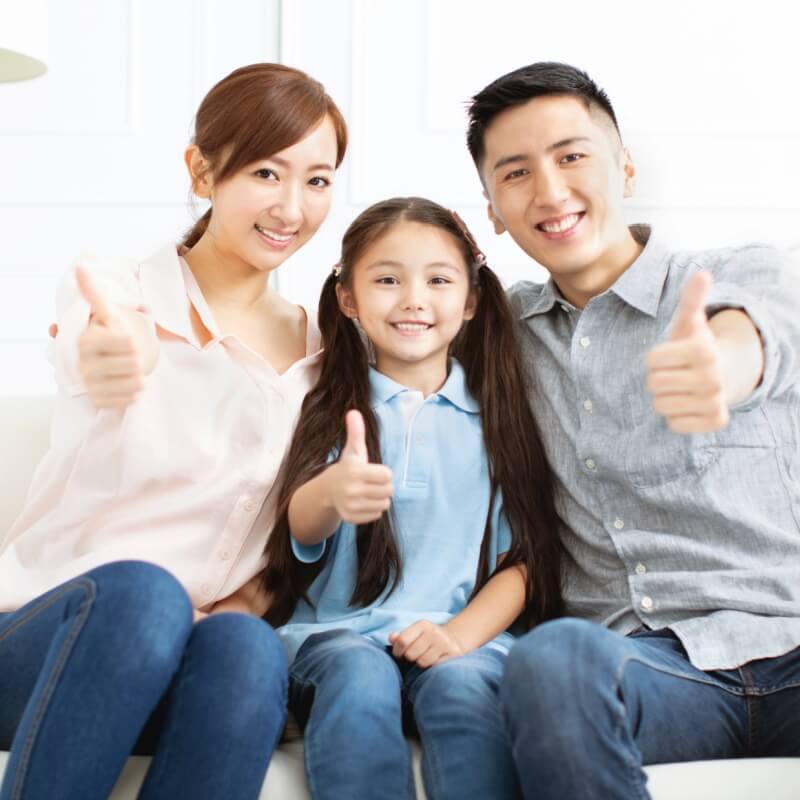 Happy parents and child having fun together