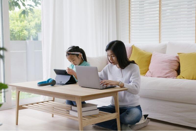 mother working from home with child