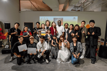 group photo of sponsors and winners of malaysia singing competition