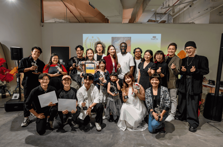 group photo of sponsors and winners of malaysia singing competition