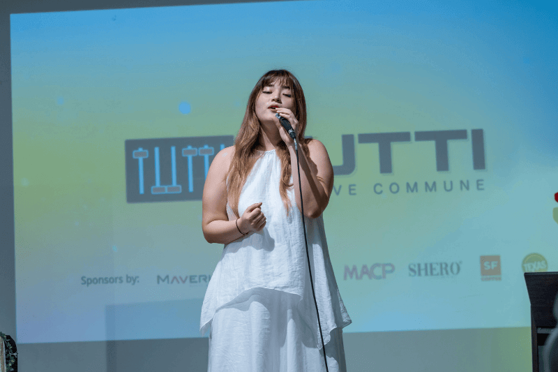girl singing as finalist in singing competition malaysia