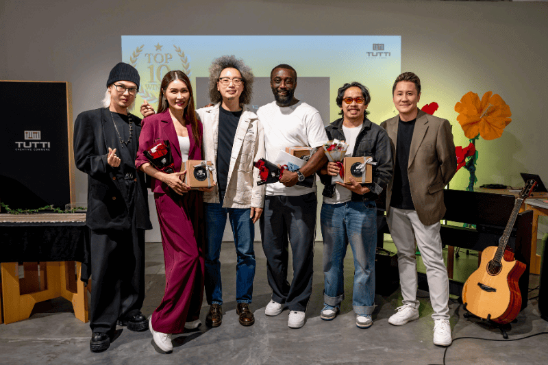 group photo of sponsors and winners of malaysia singing competition