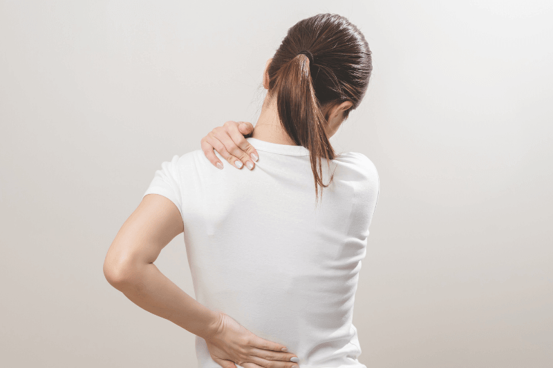 Pain body muscles stiff problem, asian young woman, girl painful with back, neck ache from work hand holding massaging rubbing shoulder hurt, sore on white background. Health care and medicine concept
