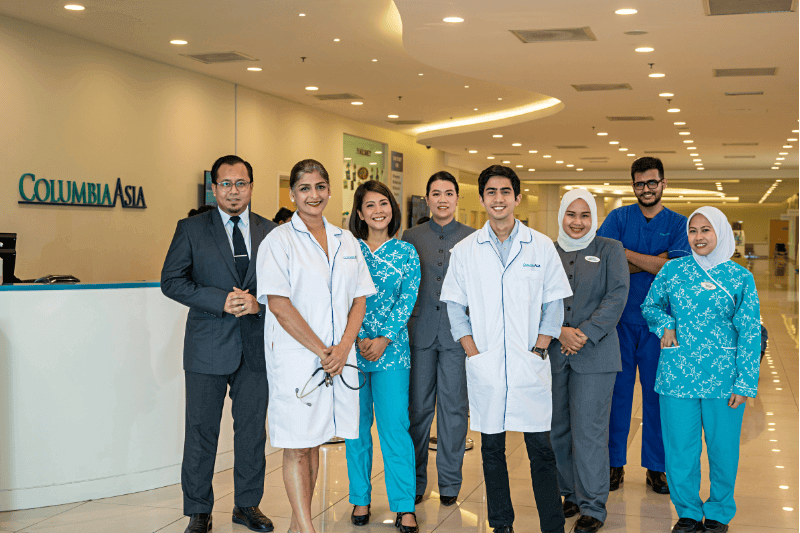 columbia asia group photo of office staff doctors and nurses