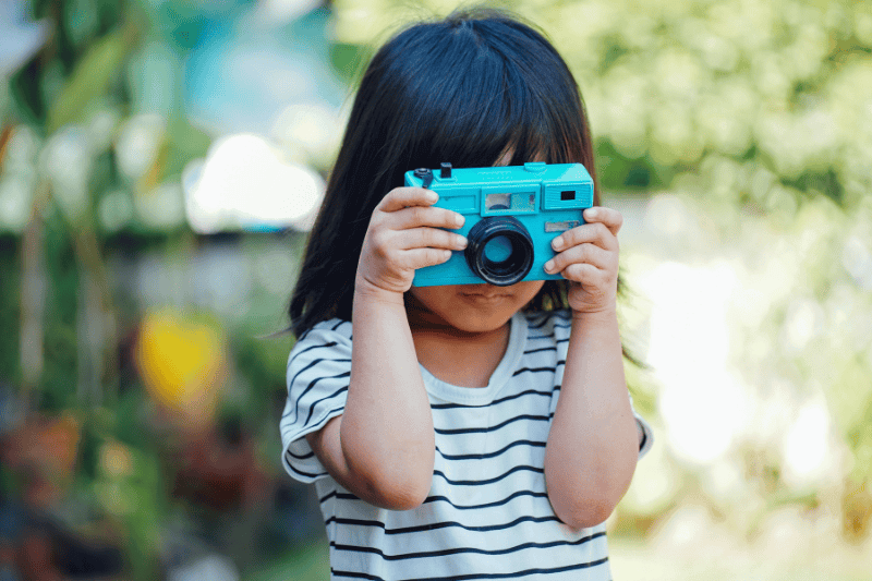 children taking pictures with child friendly camera