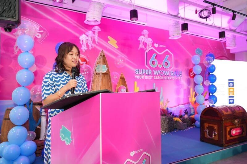 Woman on podium giving speech during campaign launch