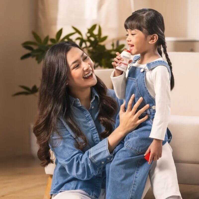 mother and daughter enjoying quality time together while drinking vitagen for gut health