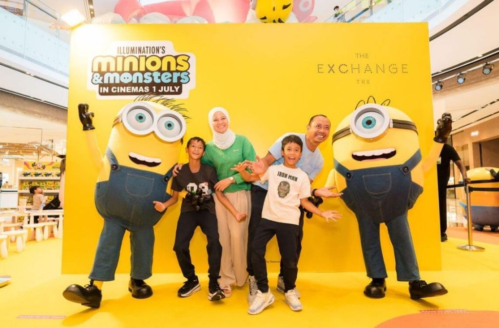 minion trx mall visitors taking photo with minion in costume