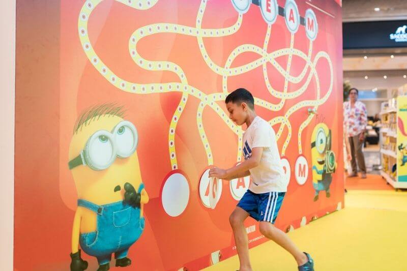 minion trx mall visitors taking photo with minion in costume