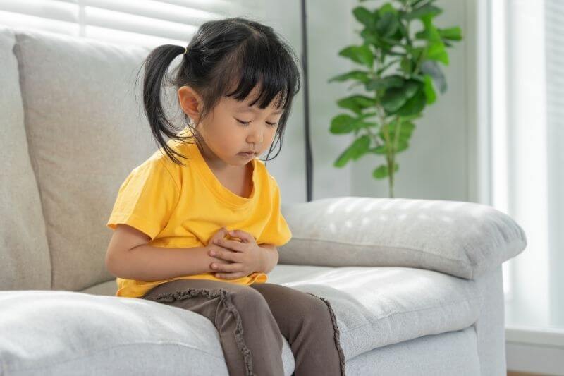 stomach ache. Children have abdominal pain from constipation