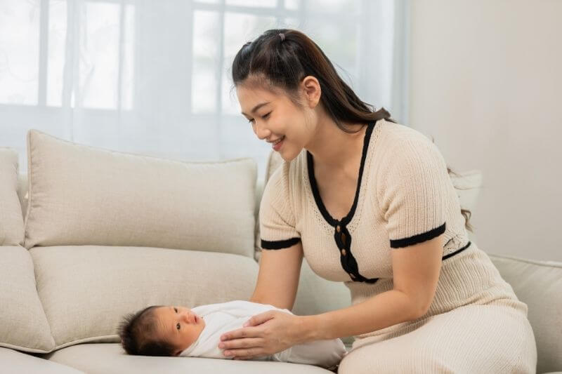 Asian mom take care baby and lovely at home