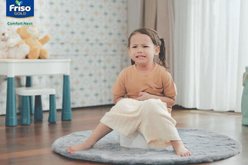 girl on potty straining constipation