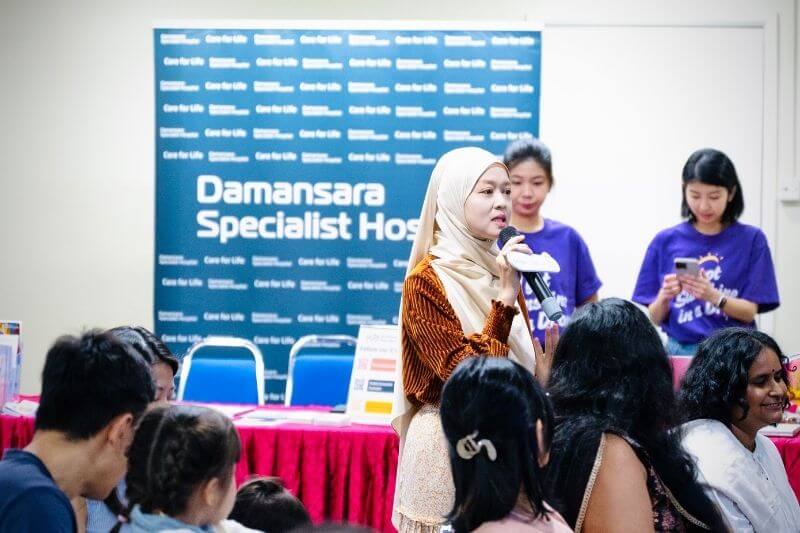 participant asking questions during parenting forum