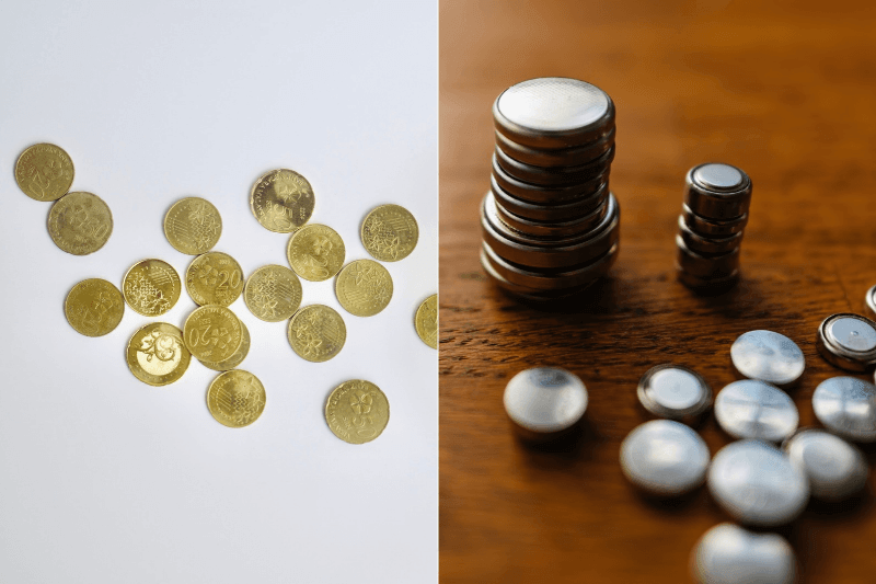 Coins and button batteries arranged as examples of small household hazards.