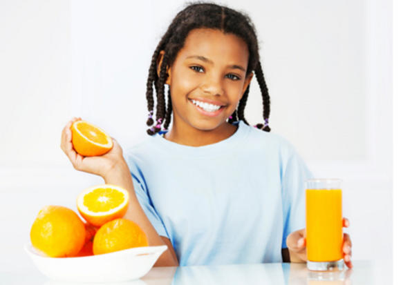 Girl Making Orange Juice