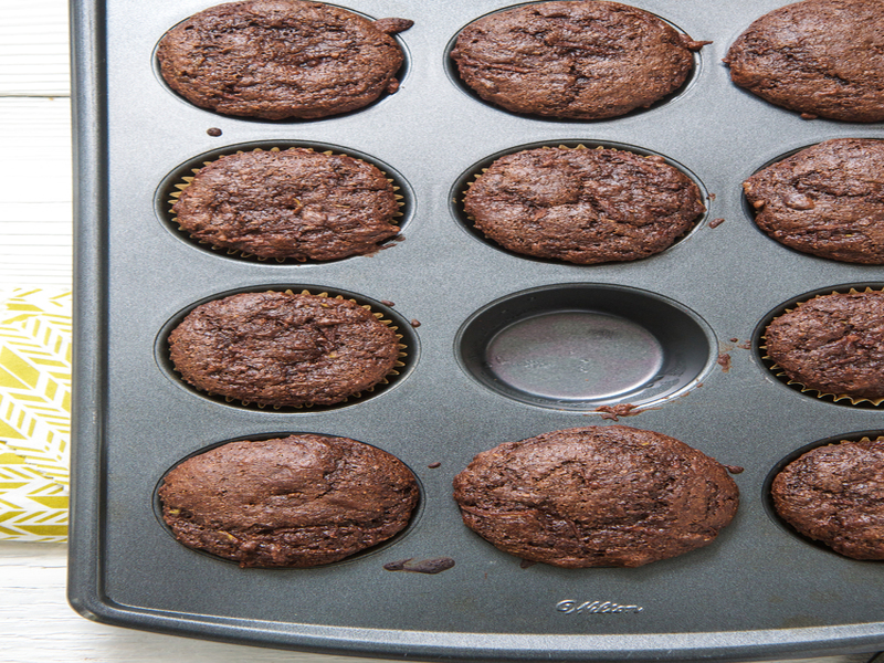1 muffin missing in a tin of freshly baked muffin