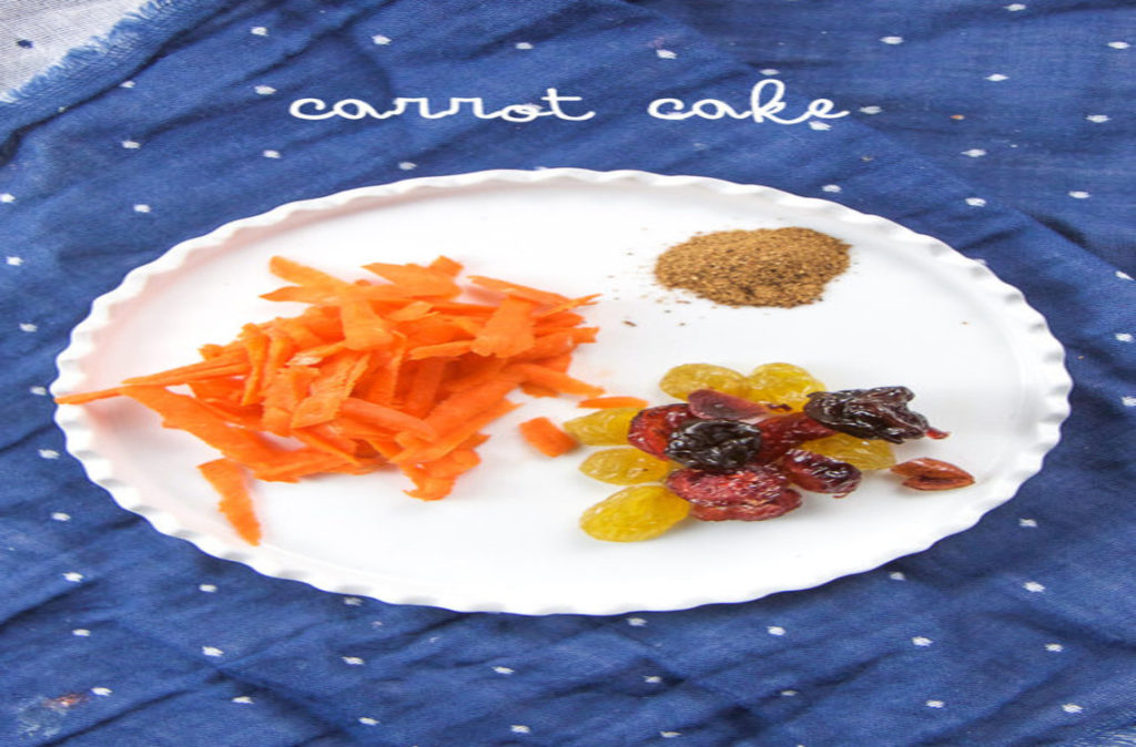 Shredded carrot, raisins, and cinnamon on a plate