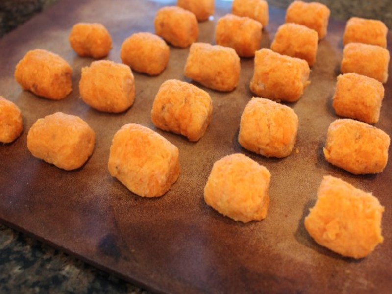sweet potato tots on a baking sheet